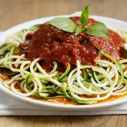 Pasta de zapallo italiano con tomates
